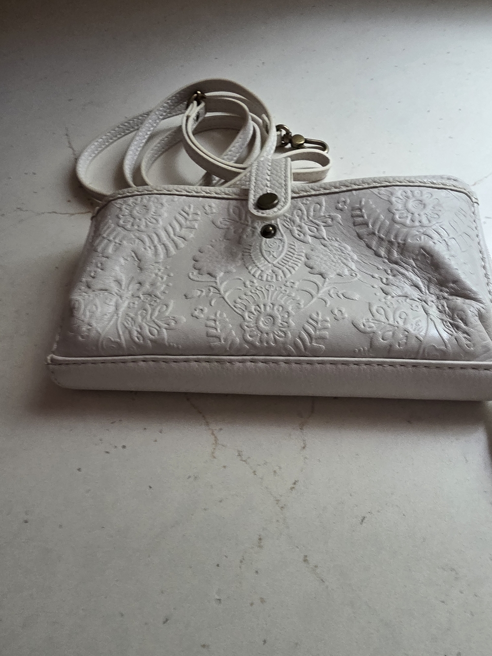 The Sak Iris Smartphone  Embossed Floral Crossbody Wallet